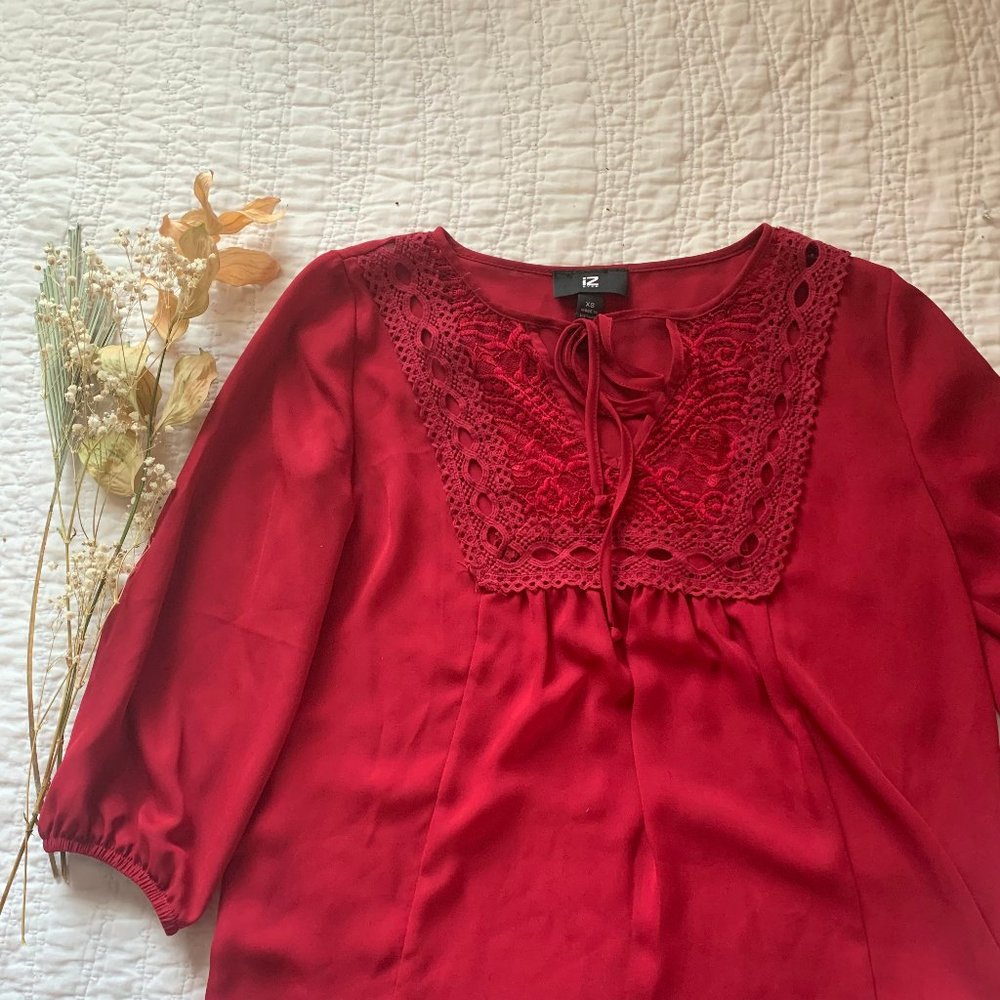 Red embroidered blouse